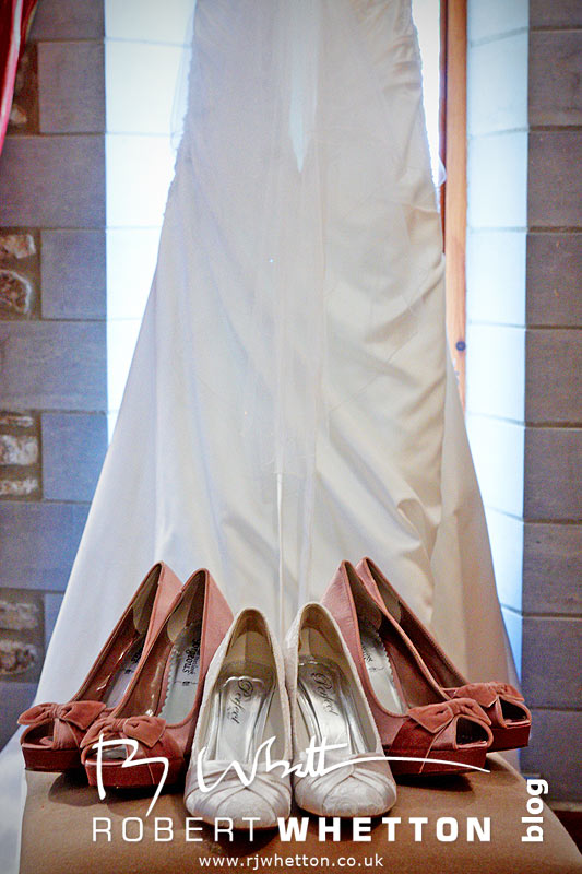 Wedding of Jo and Ben Christie at Kingston Country Courtyard, Swanage Shoes and Dress - Dorset Wedding Photographer Robert Whetton