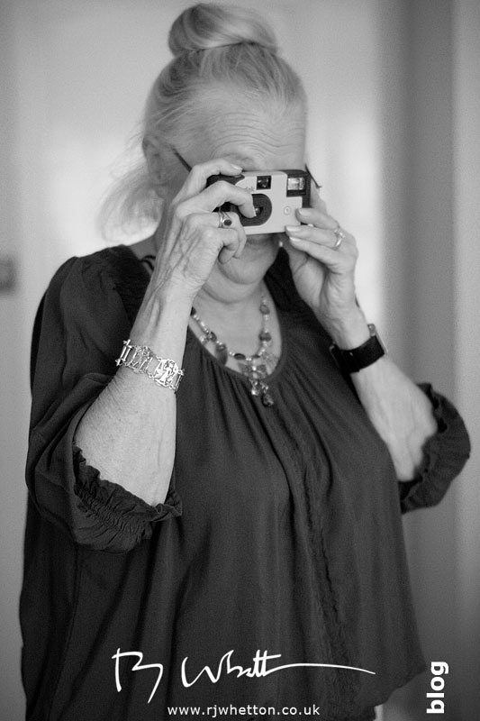 Rebecca's mum can't resist photographs with her disposable Rebecca's mum can't resist photographs with her disposable - Professional Wedding Photography Dorset