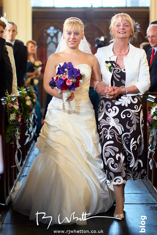 North Devon Wedding with Matt Fryer - Lynsey walking down the isle with her mum