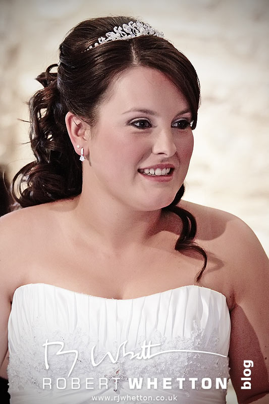 Wedding of Jo and Ben Christie at Kingston Country Courtyard, Swanage Jo in her dress looking beautiful - Dorset Wedding Photographer Robert Whetton