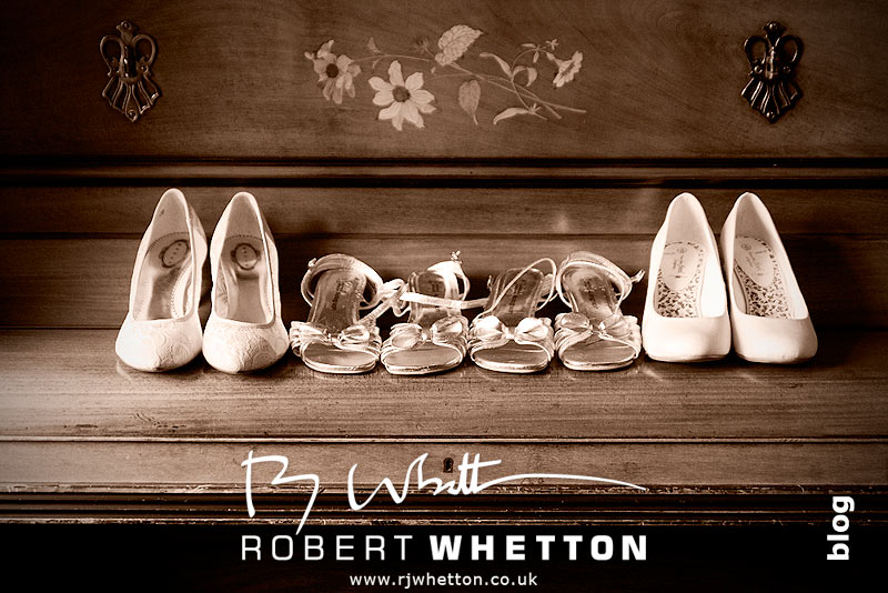 Wedding of Leah and Neil at St Marys, West Moors Wedding shoes - Dorset Wedding Photographer Robert Whetton
