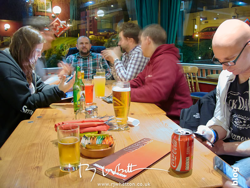 Choosing food, checking social networking and talking about photography - Shot with Canon G9 Meal out at The Red Barn in Woolacombe
