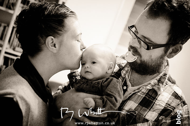 Mum grabs a quick kiss Lou grabs a kiss on Scouts head - Baby Portraits - Professional Portraits Dorset
