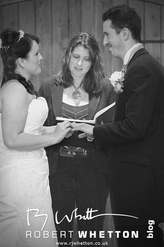 Wedding of Jo and Ben Christie at Kingston Country Courtyard, Swanage Jo and Ben exchange rings - Dorset Wedding Photographer Robert Whetton