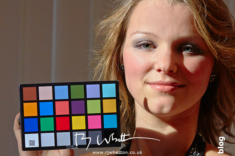 Hot light setup using Howards lights with Millie Millie Taylor holding colour chart