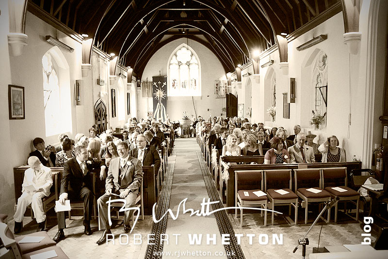 Wedding of Leah and Neil at St Marys, West Moors The Congregation - Dorset Wedding Photographer Robert Whetton