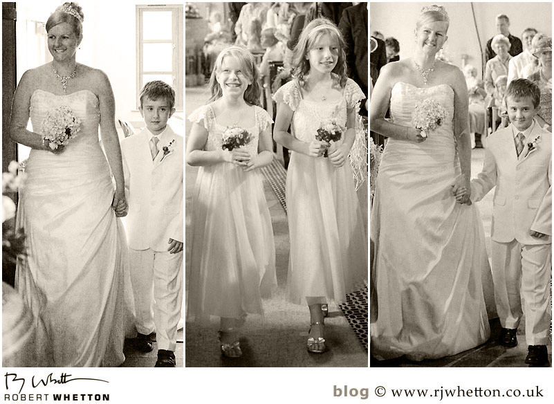 Wedding of Leah and Neil at St Marys, West Moors Leah walking down the isle - Dorset Wedding Photographer Robert Whetton