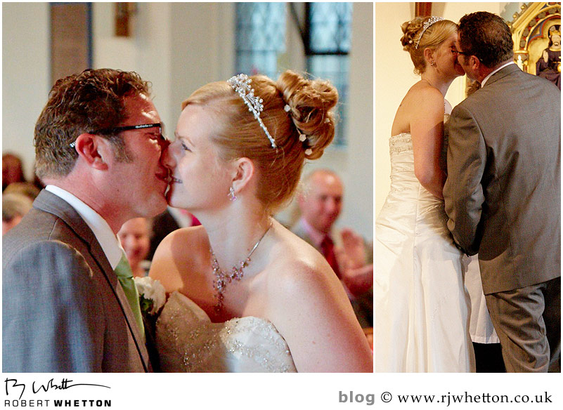 Wedding of Leah and Neil at St Marys, West Moors First kiss - Dorset Wedding Photographer Robert Whetton