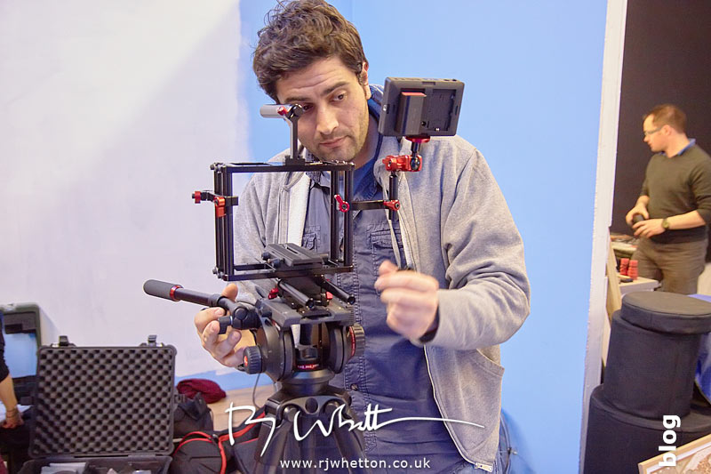 Camera man Charlie Rizek begins setting up the camera rig Yes Sir Boss - Not Guilty Production Still - Production Photography Dorset