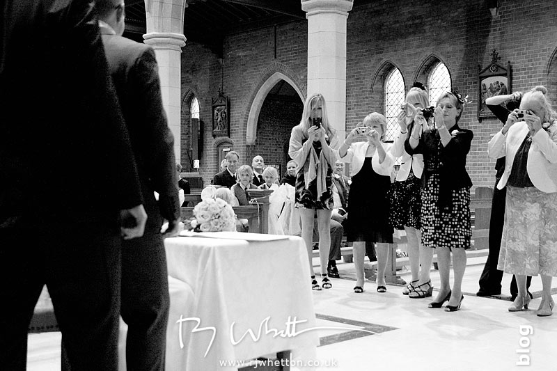 As always the wedding paparazzi are eager to take their photographs As always the wedding paparazzi are eager to take their photographs - Professional Wedding Photography Dorset