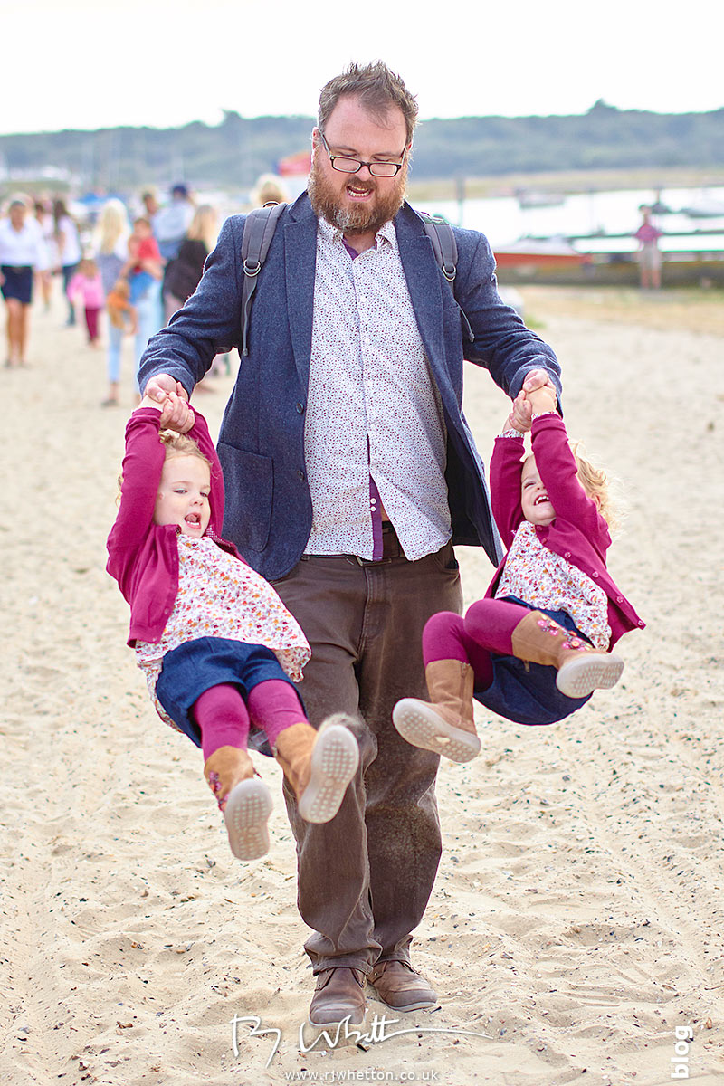 Dad gives the girls a swing Dad gives the girls a swing - Portrait Photography Dorset