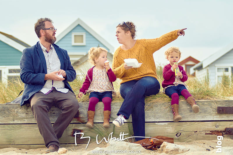Family sit to eat their treats Family sit to eat their treats - Portrait Photography Dorset