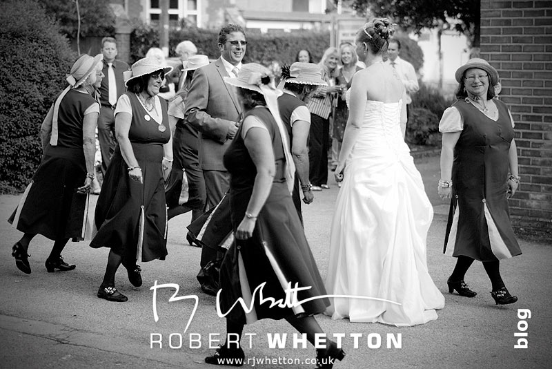 Wedding of Leah and Neil at St Marys, West Moors Morris Dancing with Leah and Neil - Dorset Wedding Photographer Robert Whetton