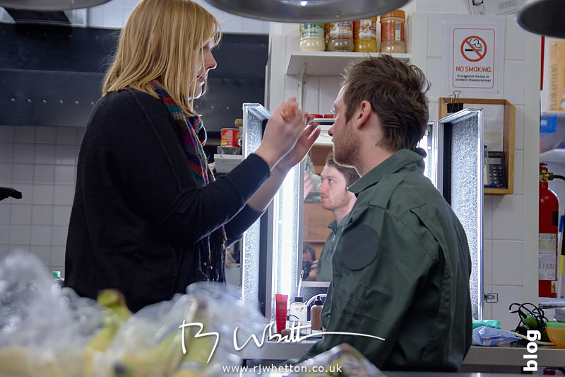 Sarah works on Matt's make-up Yes Sir Boss - Not Guilty Production Still - Production Photography Dorset