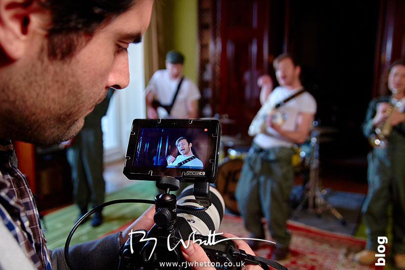 Charlie films a close up on Matt Yes Sir Boss - Not Guilty Production Still - Production Photography Dorset