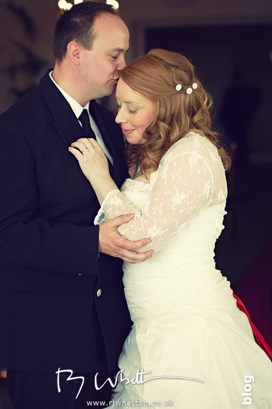 Anna and Nick embrace after giving of rings Anna and Nick embracing after giving of rings - Wedding Photography Dorset