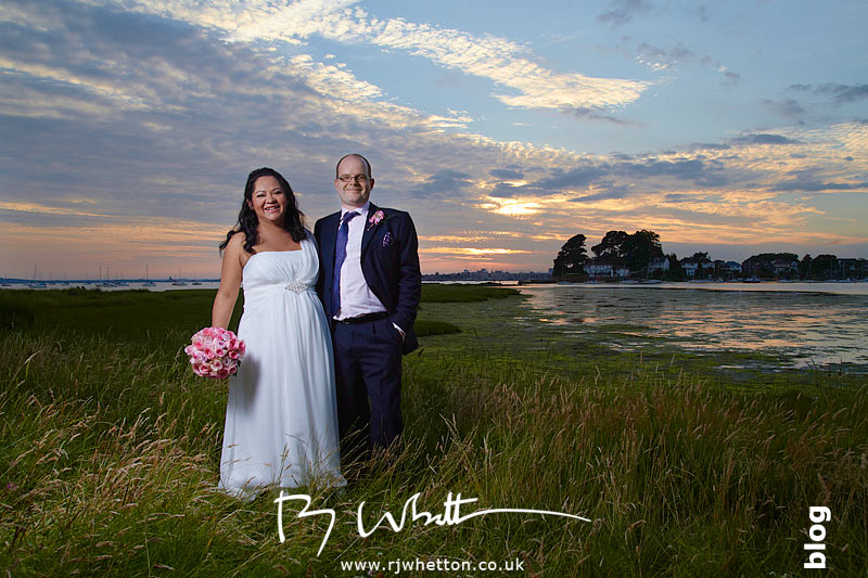 Sunset over Poole Bay Claudia and Adam pose in the sunset over Poole bay, Sandbanks - Wedding Photography Dorset